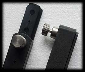 Molded adjustment rails and spring loaded locating pins